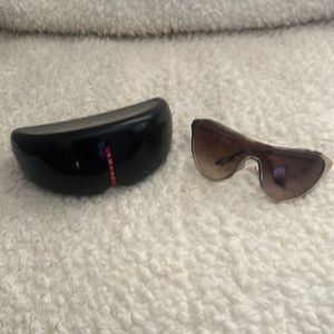 Prada women’s gold sunglasses